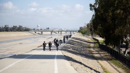 Far view of riders on path