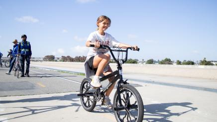 Youth riding bike