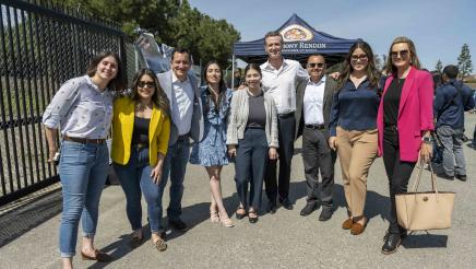 Group photo of Speaker Rendon and Gov. Newsom with staff