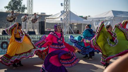 Flamenco dancers dancing to mariachi music