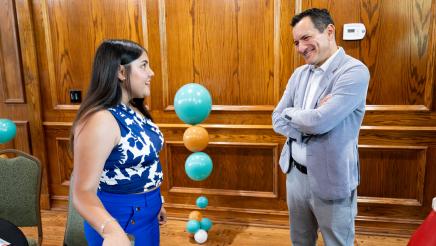 Speaker Emeritus Rendon sharing a light moment with program participant