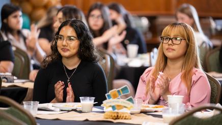 Seated program participants listening attentively