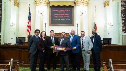 Group photo of Asm. Solache with representatives from CSU Dominguez Hills on the Assembly Floor