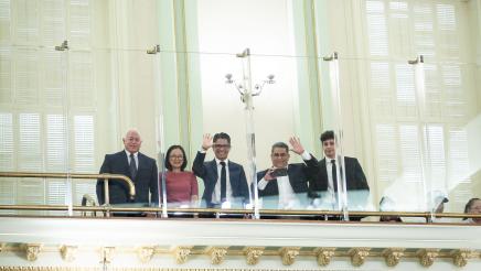 Special guests waving from the balcony