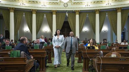 Asm. Solache escorting Caroline Dessert on the Assembly Floor