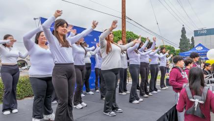 Multiple dancers dancing onstage